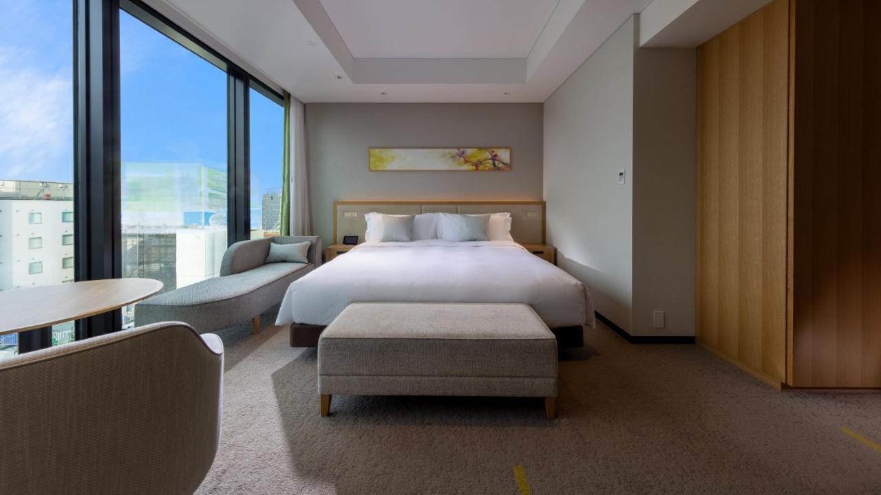 Miyako Hotel Hakata Фукуока Экстерьер фото A bedroom at the hotel